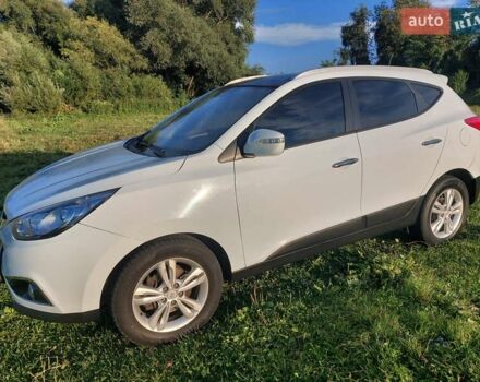 Білий Хендай іх35, об'ємом двигуна 2 л та пробігом 173 тис. км за 12300 $, фото 12 на Automoto.ua