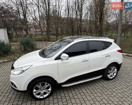 Белый Хендай их35, объемом двигателя 2.36 л и пробегом 111 тыс. км за 11999 $, фото 24 на Automoto.ua