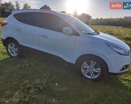 Білий Хендай іх35, об'ємом двигуна 2 л та пробігом 173 тис. км за 12300 $, фото 13 на Automoto.ua