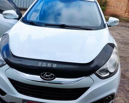 Білий Хендай іх35, об'ємом двигуна 2 л та пробігом 200 тис. км за 10800 $, фото 10 на Automoto.ua