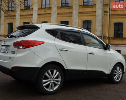 Белый Хендай их35, объемом двигателя 2.36 л и пробегом 202 тыс. км за 11300 $, фото 6 на Automoto.ua