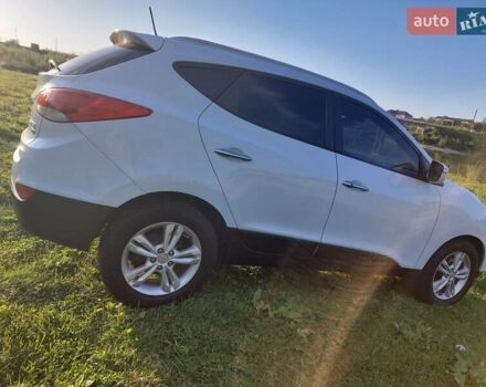 Білий Хендай іх35, об'ємом двигуна 2 л та пробігом 173 тис. км за 12300 $, фото 16 на Automoto.ua