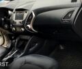 Белый Хендай их35, объемом двигателя 2 л и пробегом 215 тыс. км за 9900 $, фото 10 на Automoto.ua