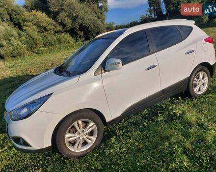 Білий Хендай іх35, об'ємом двигуна 2 л та пробігом 173 тис. км за 12300 $, фото 1 на Automoto.ua