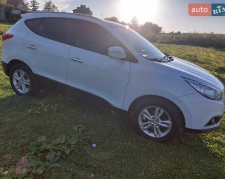 Білий Хендай іх35, об'ємом двигуна 2 л та пробігом 173 тис. км за 12300 $, фото 14 на Automoto.ua