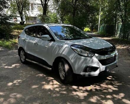 Белый Хендай их35, объемом двигателя 2 л и пробегом 162 тыс. км за 11300 $, фото 9 на Automoto.ua