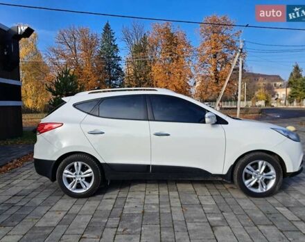 Білий Хендай іх35, об'ємом двигуна 2 л та пробігом 119 тис. км за 12600 $, фото 23 на Automoto.ua