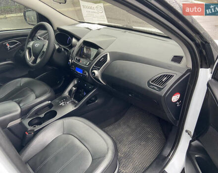 Білий Хендай іх35, об'ємом двигуна 2 л та пробігом 182 тис. км за 11999 $, фото 12 на Automoto.ua