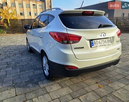 Білий Хендай іх35, об'ємом двигуна 2 л та пробігом 119 тис. км за 12600 $, фото 31 на Automoto.ua
