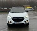 Білий Хендай іх35, об'ємом двигуна 2 л та пробігом 182 тис. км за 11999 $, фото 1 на Automoto.ua