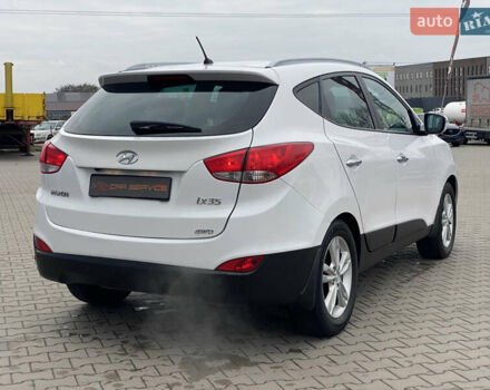 Белый Хендай их35, объемом двигателя 2 л и пробегом 145 тыс. км за 11500 $, фото 7 на Automoto.ua