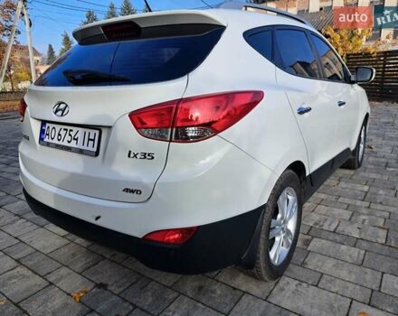 Білий Хендай іх35, об'ємом двигуна 2 л та пробігом 119 тис. км за 12600 $, фото 27 на Automoto.ua