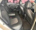 Білий Хендай іх35, об'ємом двигуна 2 л та пробігом 158 тис. км за 12700 $, фото 18 на Automoto.ua