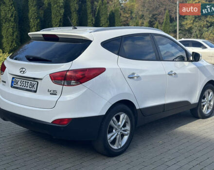 Білий Хендай іх35, об'ємом двигуна 1.69 л та пробігом 248 тис. км за 11450 $, фото 7 на Automoto.ua