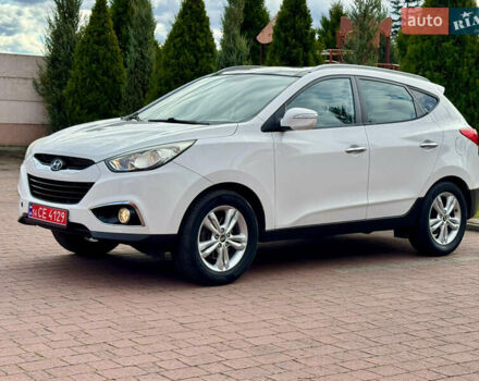 Білий Хендай іх35, об'ємом двигуна 2 л та пробігом 169 тис. км за 13800 $, фото 6 на Automoto.ua