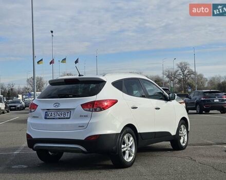 Белый Хендай их35, объемом двигателя 2 л и пробегом 137 тыс. км за 12600 $, фото 27 на Automoto.ua