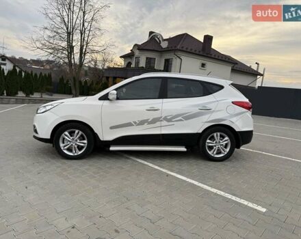 Білий Хендай іх35, об'ємом двигуна 2 л та пробігом 133 тис. км за 9600 $, фото 1 на Automoto.ua