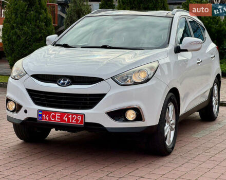 Білий Хендай іх35, об'ємом двигуна 2 л та пробігом 169 тис. км за 13800 $, фото 9 на Automoto.ua