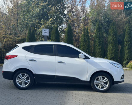 Білий Хендай іх35, об'ємом двигуна 1.69 л та пробігом 248 тис. км за 11450 $, фото 6 на Automoto.ua