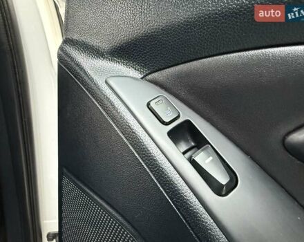 Білий Хендай іх35, об'ємом двигуна 2 л та пробігом 132 тис. км за 9999 $, фото 66 на Automoto.ua