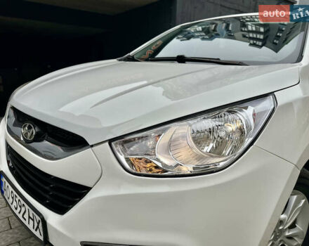 Белый Хендай их35, объемом двигателя 2 л и пробегом 178 тыс. км за 11900 $, фото 16 на Automoto.ua