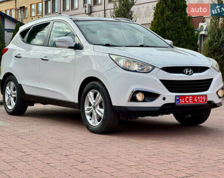 Білий Хендай іх35, об'ємом двигуна 2 л та пробігом 169 тис. км за 13800 $, фото 1 на Automoto.ua