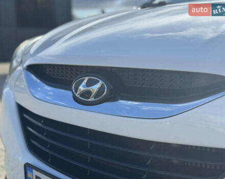 Білий Хендай іх35, об'ємом двигуна 1.69 л та пробігом 248 тис. км за 11450 $, фото 14 на Automoto.ua