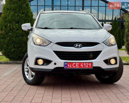 Белый Хендай их35, объемом двигателя 2 л и пробегом 169 тыс. км за 13300 $, фото 7 на Automoto.ua