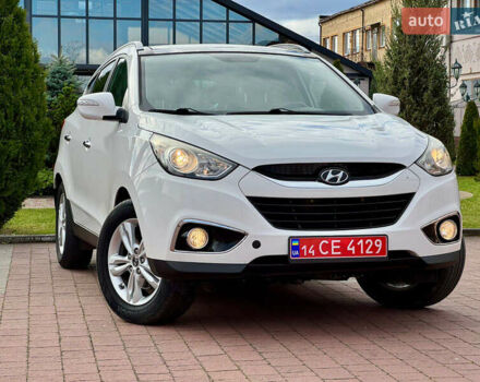 Білий Хендай іх35, об'ємом двигуна 2 л та пробігом 169 тис. км за 13800 $, фото 2 на Automoto.ua