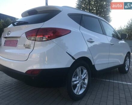 Білий Хендай іх35, об'ємом двигуна 1.7 л та пробігом 187 тис. км за 11985 $, фото 32 на Automoto.ua