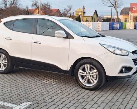 Білий Хендай іх35, об'ємом двигуна 2 л та пробігом 208 тис. км за 13999 $, фото 39 на Automoto.ua