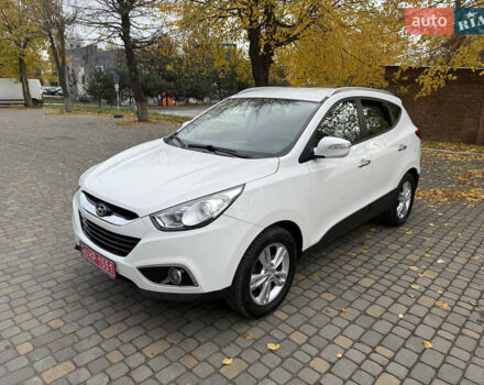 Білий Хендай іх35, об'ємом двигуна 2 л та пробігом 180 тис. км за 16300 $, фото 6 на Automoto.ua