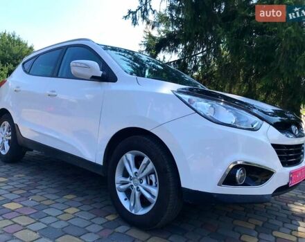 Білий Хендай іх35, об'ємом двигуна 1.7 л та пробігом 187 тис. км за 11850 $, фото 16 на Automoto.ua