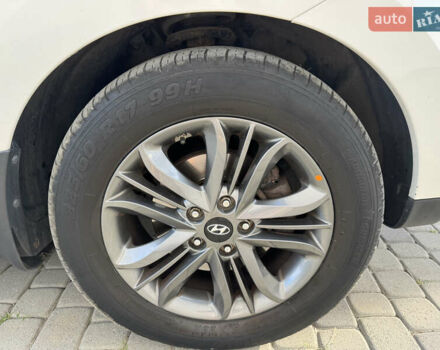 Білий Хендай іх35, об'ємом двигуна 2 л та пробігом 238 тис. км за 14900 $, фото 12 на Automoto.ua