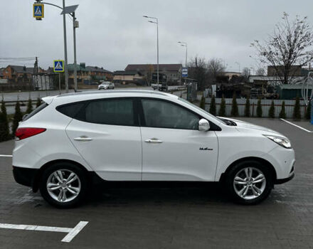 Білий Хендай іх35, об'ємом двигуна 1.69 л та пробігом 220 тис. км за 13300 $, фото 7 на Automoto.ua