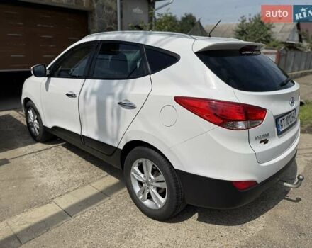 Білий Хендай іх35, об'ємом двигуна 1.7 л та пробігом 205 тис. км за 12500 $, фото 3 на Automoto.ua