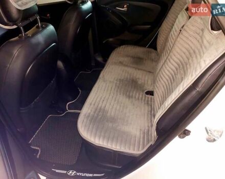 Білий Хендай іх35, об'ємом двигуна 1.69 л та пробігом 218 тис. км за 13800 $, фото 7 на Automoto.ua