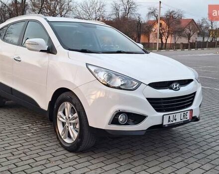 Білий Хендай іх35, об'ємом двигуна 2 л та пробігом 208 тис. км за 13999 $, фото 9 на Automoto.ua