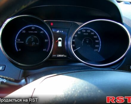 Білий Хендай іх35, об'ємом двигуна 2 л та пробігом 128 тис. км за 16000 $, фото 7 на Automoto.ua