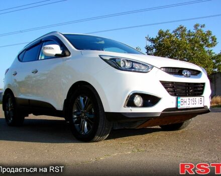 Білий Хендай іх35, об'ємом двигуна 2 л та пробігом 128 тис. км за 16000 $, фото 1 на Automoto.ua