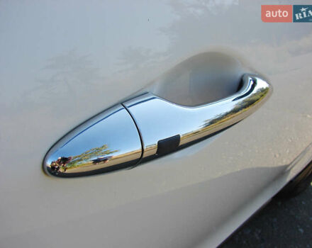 Белый Хендай их35, объемом двигателя 2 л и пробегом 128 тыс. км за 15500 $, фото 6 на Automoto.ua