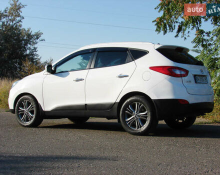 Белый Хендай их35, объемом двигателя 2 л и пробегом 128 тыс. км за 15500 $, фото 10 на Automoto.ua