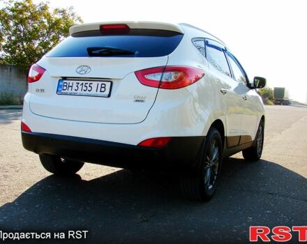 Білий Хендай іх35, об'ємом двигуна 2 л та пробігом 128 тис. км за 16000 $, фото 3 на Automoto.ua