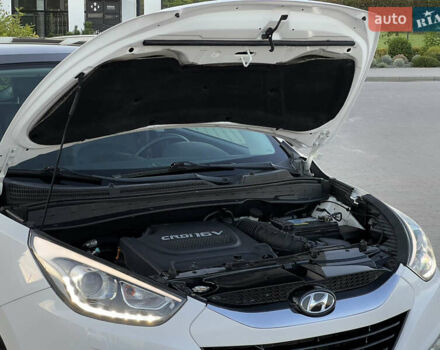 Білий Хендай іх35, об'ємом двигуна 2 л та пробігом 209 тис. км за 15700 $, фото 74 на Automoto.ua
