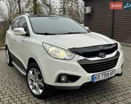 Білий Хендай іх35, об'ємом двигуна 2.36 л та пробігом 111 тис. км за 11999 $, фото 1 на Automoto.ua