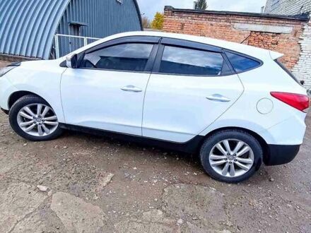 Білий Хендай іх35, об'ємом двигуна 2 л та пробігом 200 тис. км за 10800 $, фото 1 на Automoto.ua