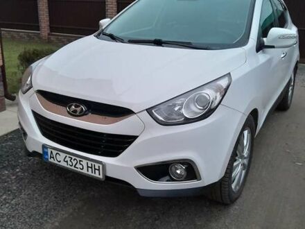 Білий Хендай іх35, об'ємом двигуна 2 л та пробігом 215 тис. км за 13750 $, фото 1 на Automoto.ua