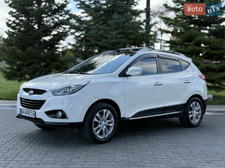 Белый Хендай их35, объемом двигателя 2.4 л и пробегом 234 тыс. км за 11500 $, фото 1 на Automoto.ua