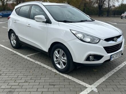 Білий Хендай іх35, об'ємом двигуна 2 л та пробігом 242 тис. км за 12012 $, фото 1 на Automoto.ua