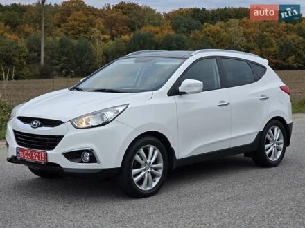 Білий Хендай іх35, об'ємом двигуна 2 л та пробігом 211 тис. км за 12999 $, фото 1 на Automoto.ua